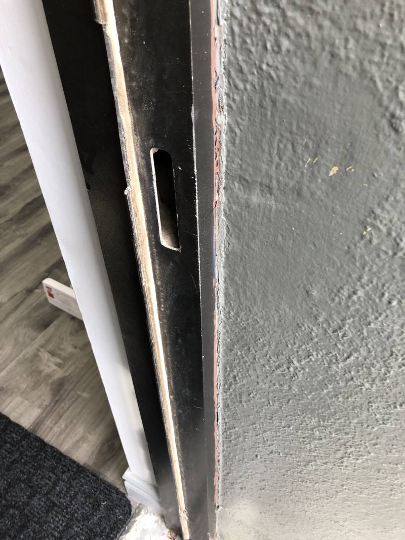 Commercial door frame prepared for access control installation in Ottawa