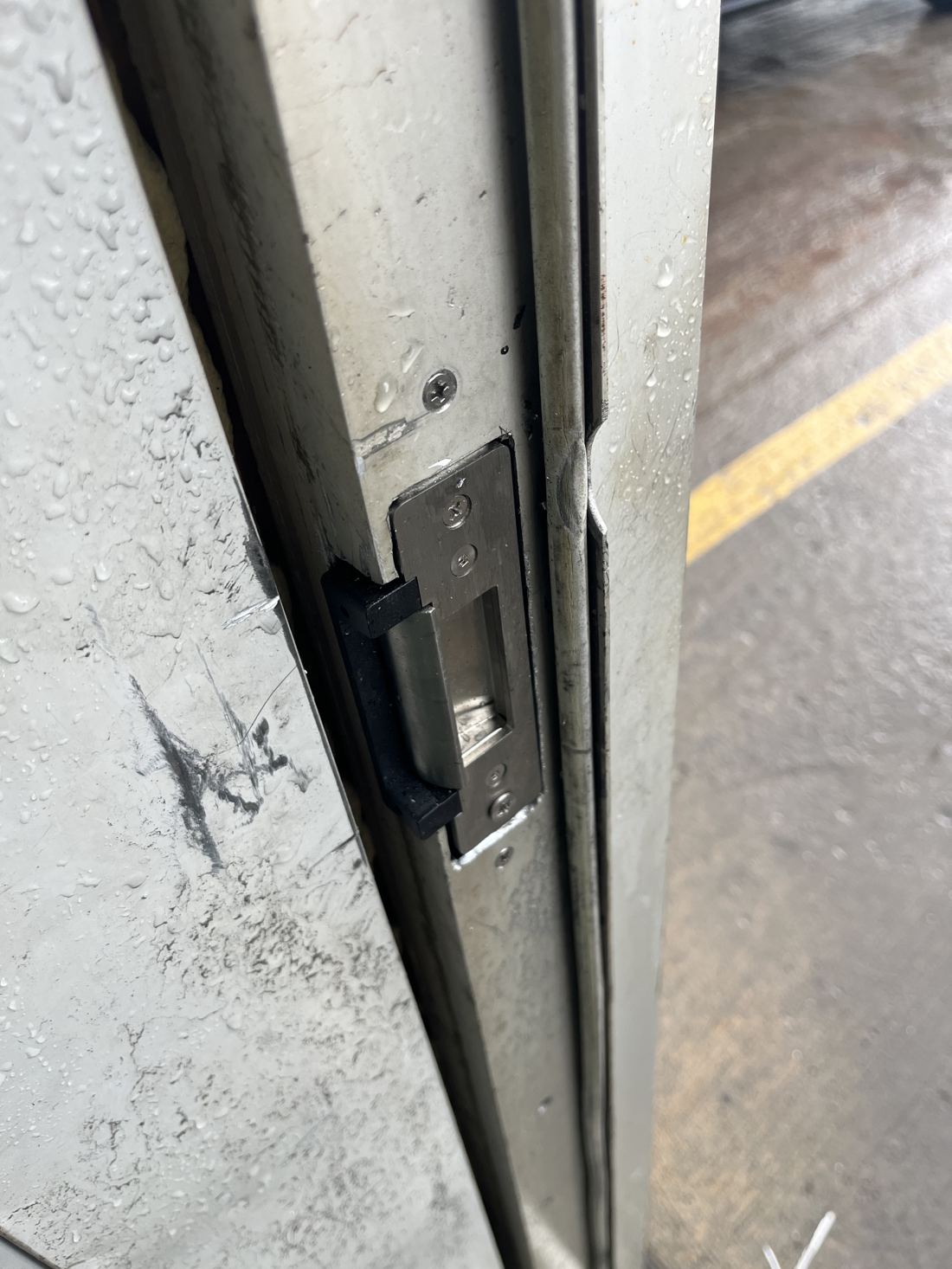 Electric strike hardware installed in a commercial door frame in Ottawa