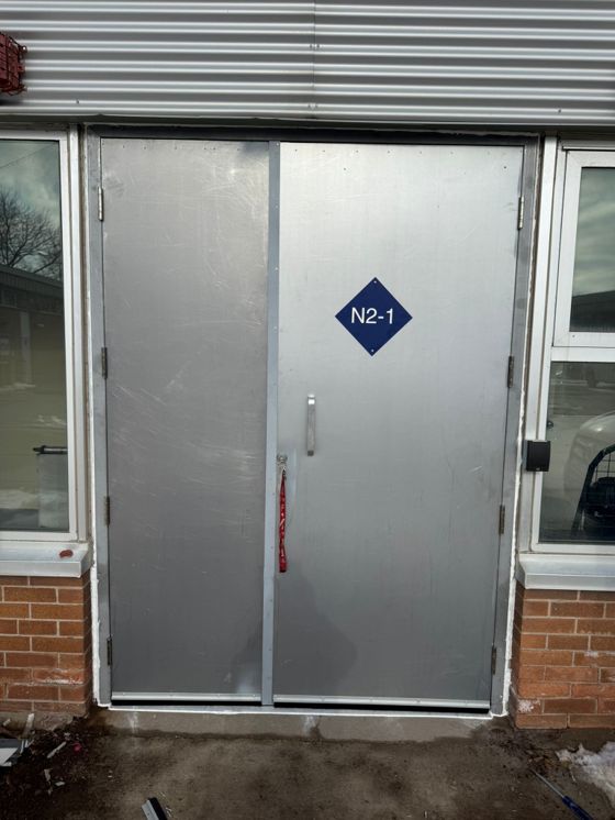 Fire-rated door assembly in an Ottawa building