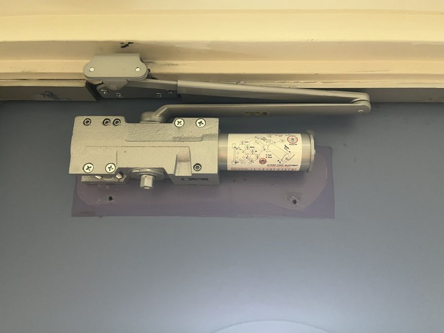 Commercial door closer adjusted and re-set in Ottawa