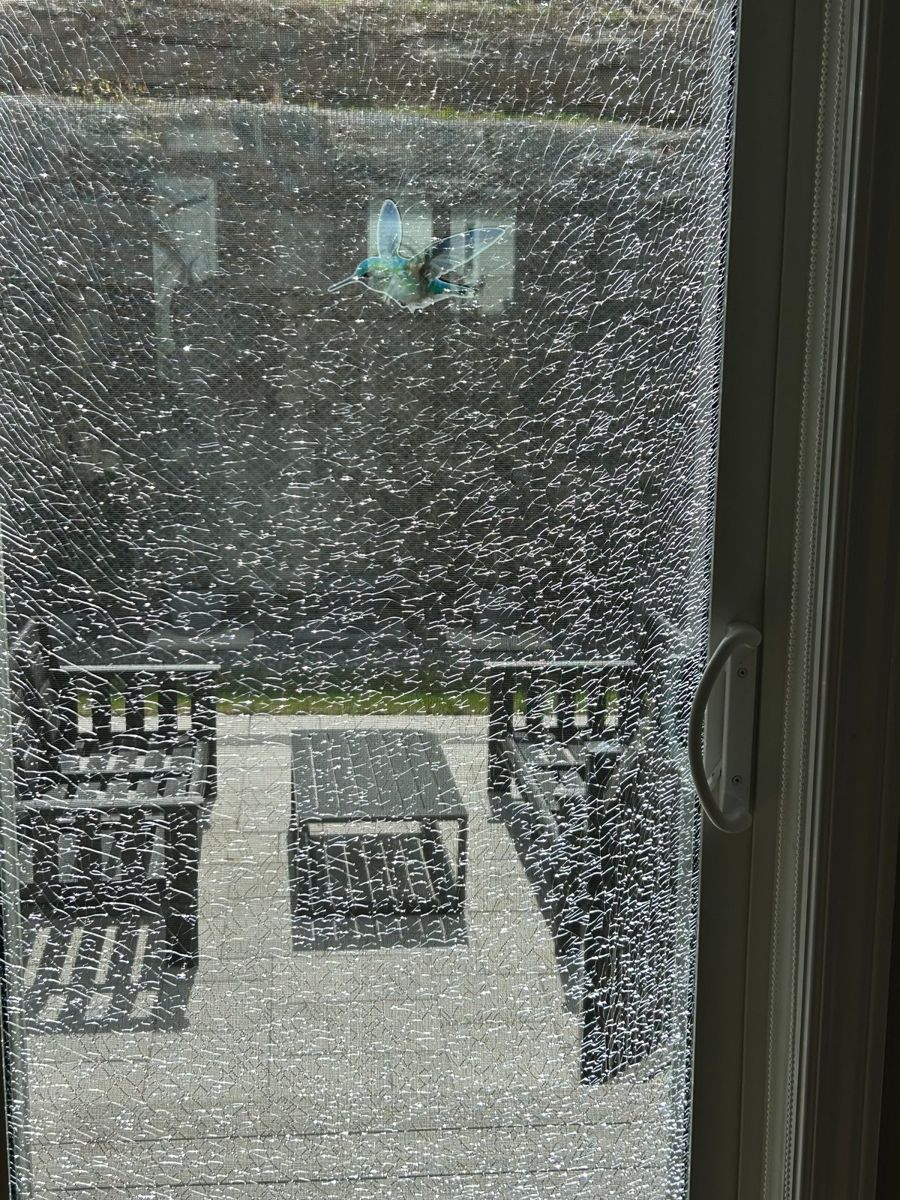 Shattered tempered glass panel ready for board up and replacement in Ottawa