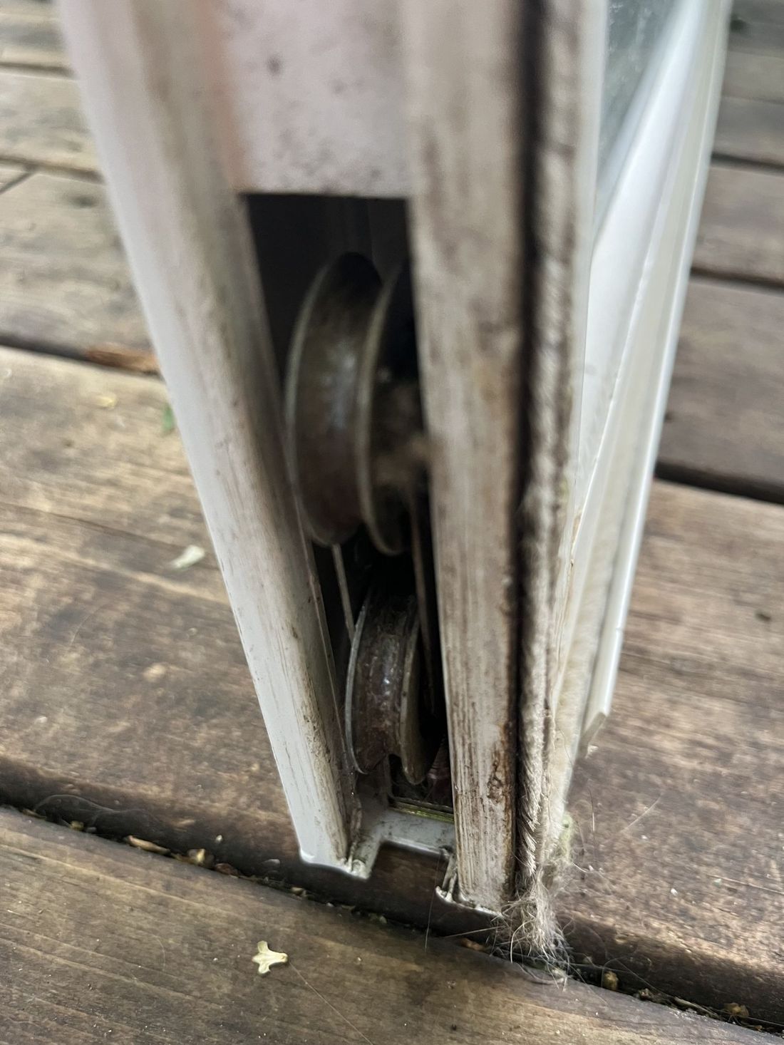 Sliding patio door roller and track repair in progress at an Ottawa home