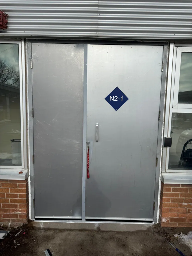 Fire-rated door assembly in an Ottawa building