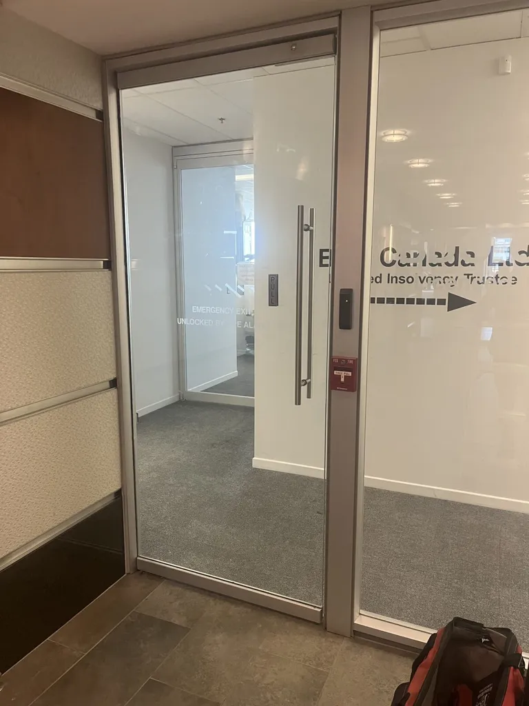 Glass storefront door panel replacement in Ottawa