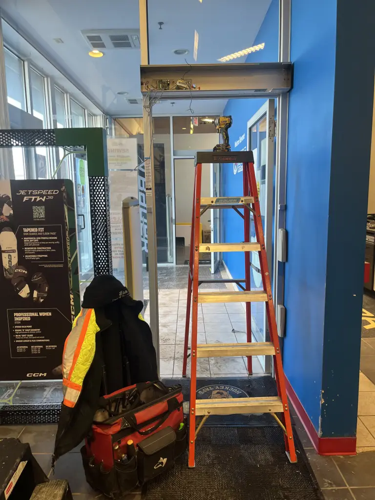 Door operator installation at an Ottawa commercial entrance