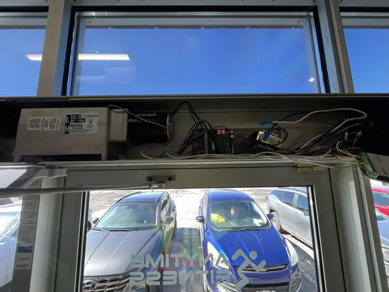 Pedestrian door operator installed above an Ottawa accessible entrance