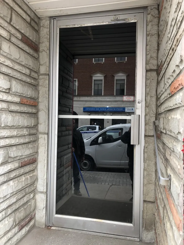 Aluminum storefront door repaired in Ottawa