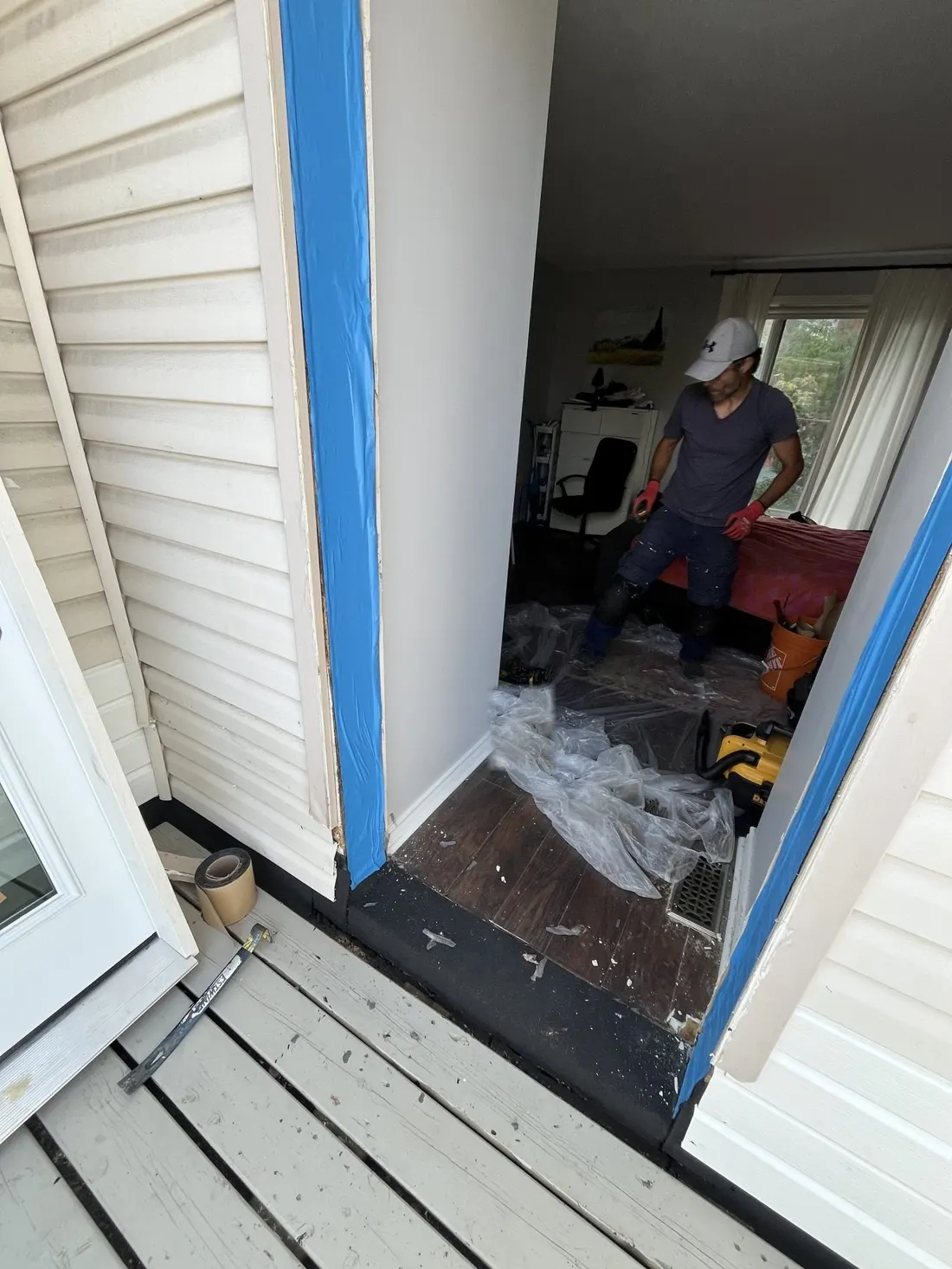 Exterior door opening being prepared after damaged material was removed